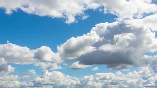 Clouds Moving Across a Blue Sky