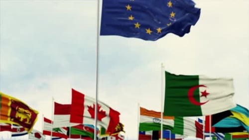 International Flags Waving with European Union Flag in Focus