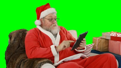 Papai Noel usando tablet digital