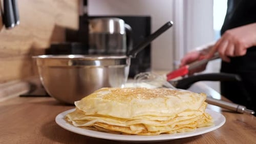 Fresh Homemade Pancakes Being Cooked in Kitchen