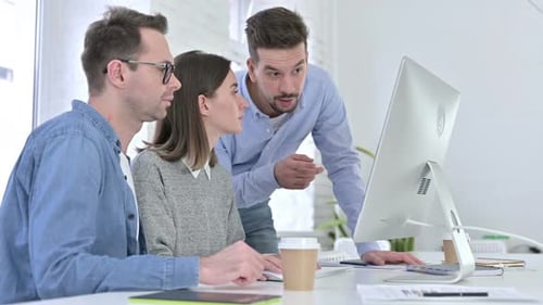 Teamwork in Modern Office Collaborative Project