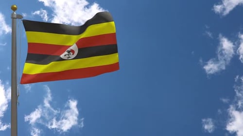 Waving Uganda National Flag Against Blue Sky
