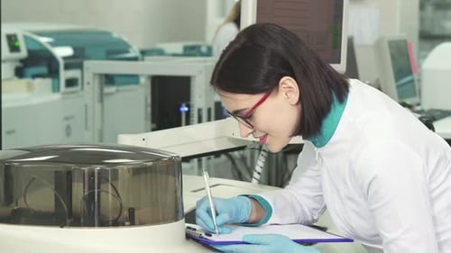Woman Scientist Working in Modern Medical Laboratory