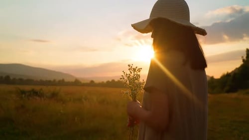 Happy Female Posing with Chamomiles