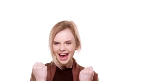 Woman Cheering and Celebrating in Front of White Background