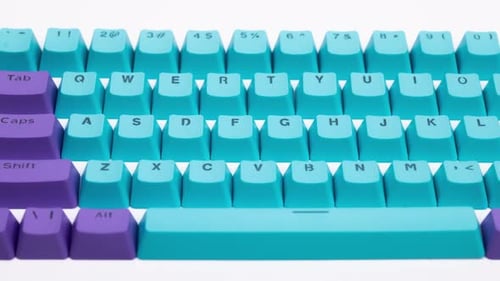 Keyboard Close Up with Blue and Purple Keys