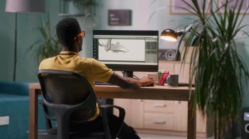 Black 3D Designer Working in Home Office