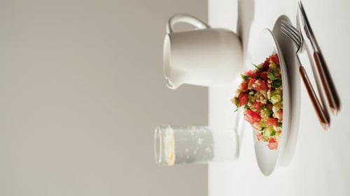 Colorful Salad with White Pitcher and Glass Arrangement