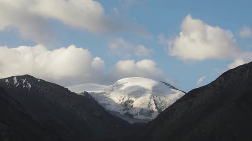 Timelapse of Running Clouds in the Mountains