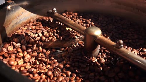 Fresh Coffee Beans Roasting in Metal Pan