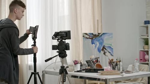 Teenage Boy Preparing to Shoot Makeup Tutorial