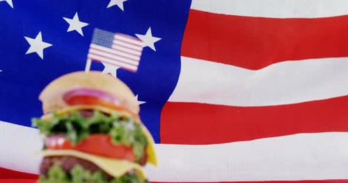 Double Cheeseburger With American Flag Background