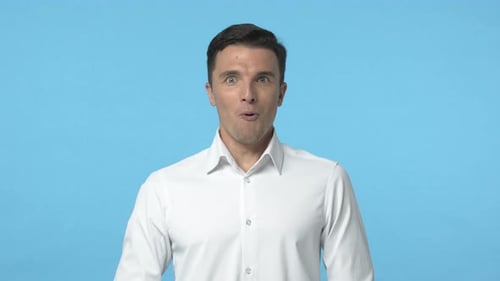 Surprised Man Reacting with Shock and Amazement