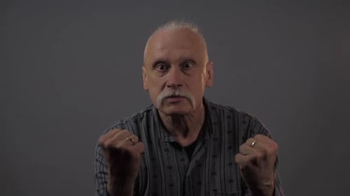 Senior Man Expressing Agitation and Stress