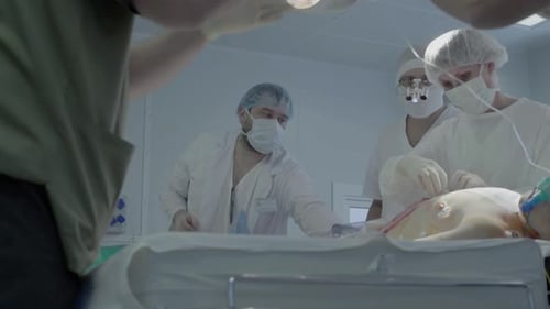 Staff of the Operating Unit Prepares the Patient for Transoprotection to the Ward After the