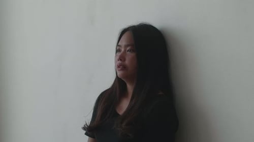 Asian Young Woman Sad And Depressed