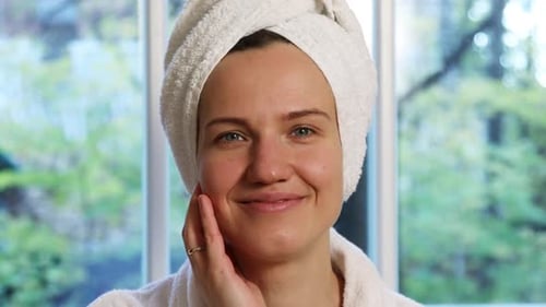 Woman in Robe Smiling after Shower