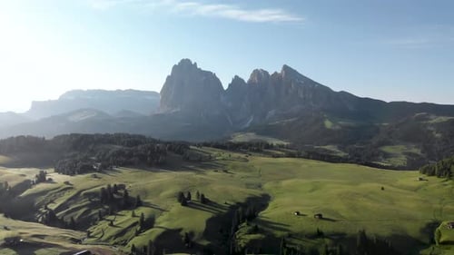 Aerial view of alpine landscapes in the Dolomites mountain range with blooming meadows