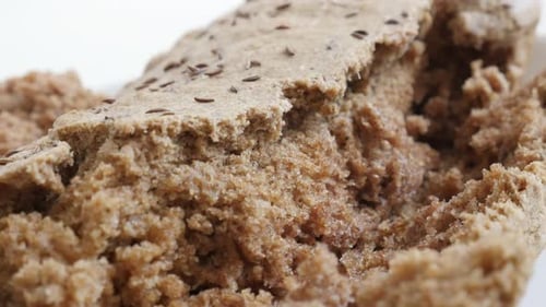 Close-Up of Rustic Brown Bread with Seeds