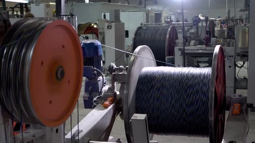 an Electrical Cable in Isolation Is Wound on a Metal Coil