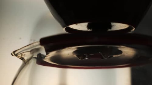 Coffee Dripping into a Carafe in Close Up