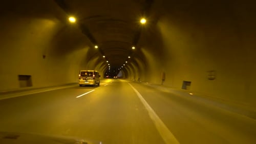 Car Driving Through Tunnel at Night POV