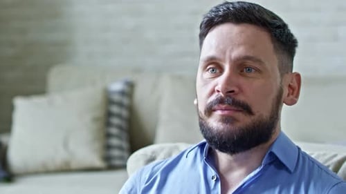 Man Talking, Giving Advice Indoors