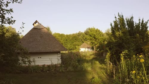 Traditional White Hut Houses with Straw Roofs