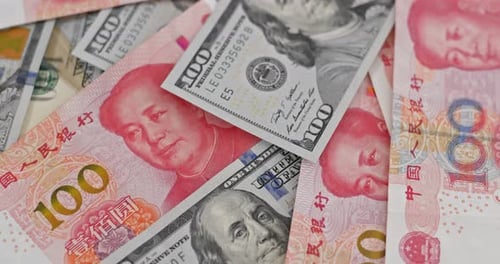 US Dollar and Chinese Yuan Currency Close Up