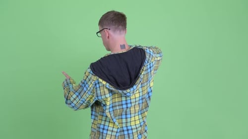 Rear View of Nerd Man Touching Something