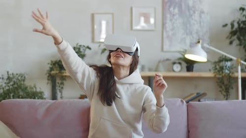 Young Woman Experiencing Virtual Reality Headset