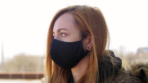 Young Adult Woman Wearing Protective Face Mask