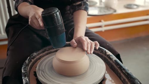 Artist Uses Hair Dryer to Dry Clay