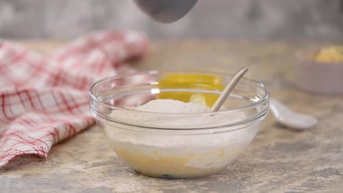Chef Prepares Dough for Baking. Adding Flour in Glass Bowl.