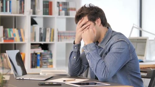 Headache Tense Creative Man at Work