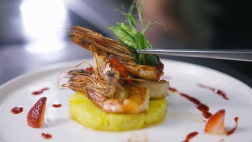 Gourmet Seafood Dish Being Prepared in Restaurant