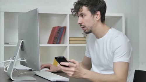 Young Man Using Smartphone Text Messaging