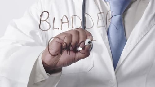 Doctor Writes Bladder Cancer on Glass Surface