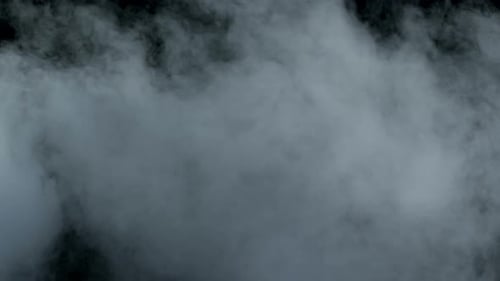 Abstract White Fog Clouds Against Black Background