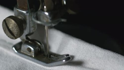 Sewing Machine Needle Sewing White Fabric Close Up