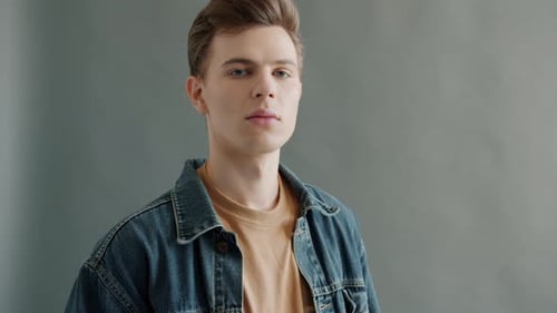 Young Adult Man Posing in Denim Jacket