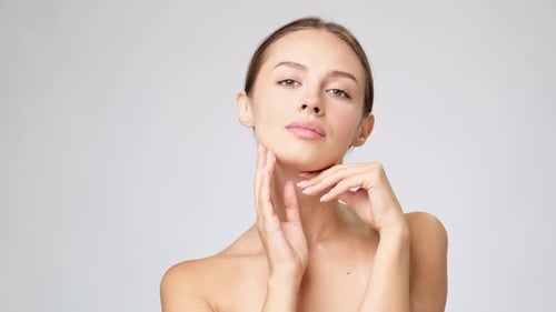 Elegant Young Woman Posing for Skincare