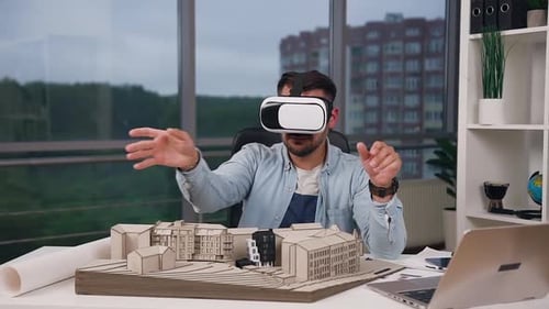 Architect Using VR Headset to Design Building