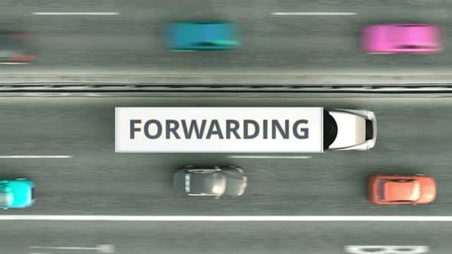 Trailer Trucks with FORWARDING Text Driving Along the Highway