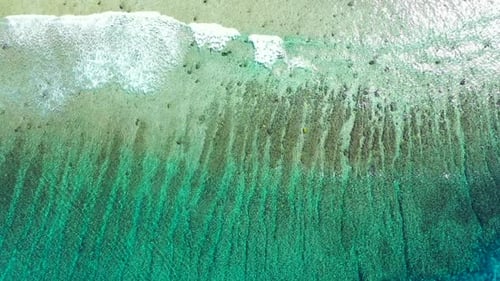 Aerial abstract of idyllic resort beach vacation by clear sea and white sandy background of a dayout