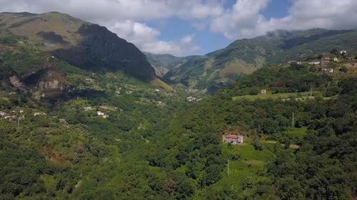 Aerial Mountain Gorge Hills Covered with Forest. Beautiful Mountain Landscape Sunny Weather in Italy