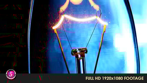 Light Bulb Filament Glows Orange Hot