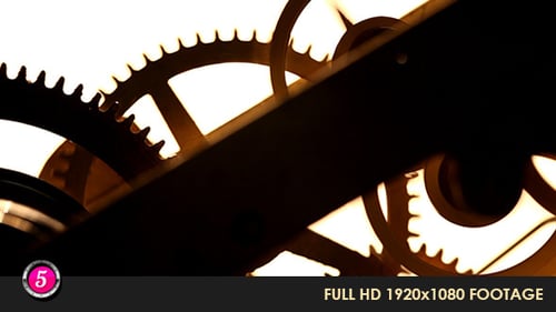 Clock Gears Turning in Silhouette