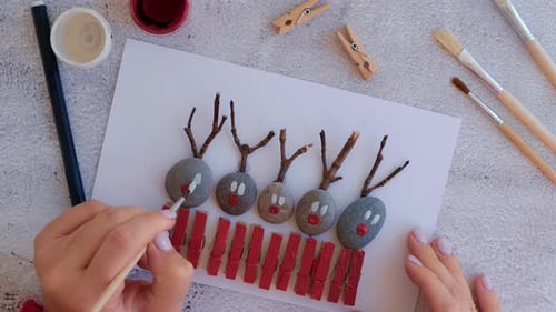 Making Diy Merry Christmas Deer on Greeting Card Postcard Made of Pebbles Sea Stones Clothespins and