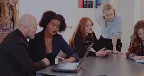 Professionals Discussing Strategy in Meeting at Office